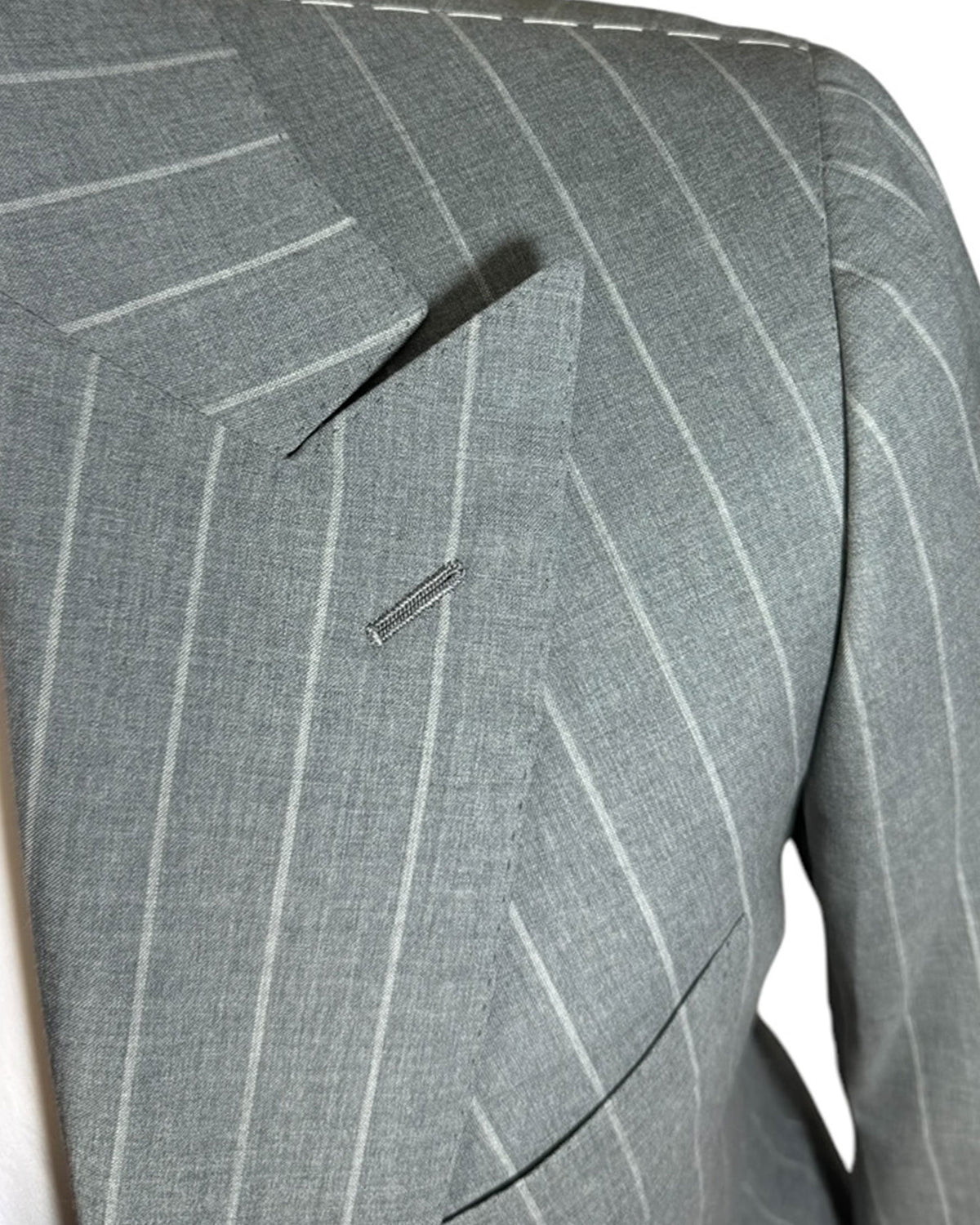 Cesare Attolini Suit 
Peak Lapel